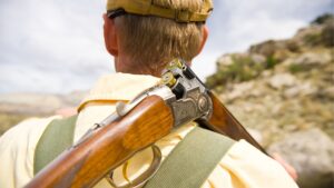 hunter in Colorado with shotgun