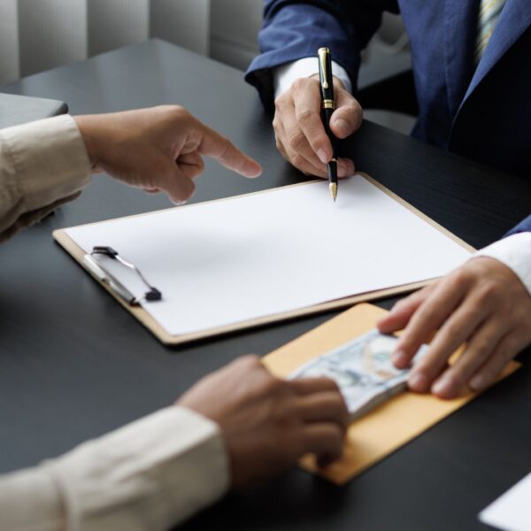 Signing a contract and receiving payment