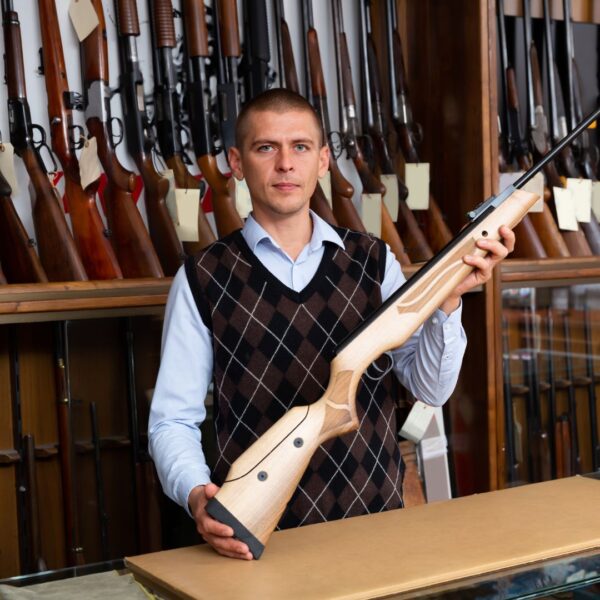 person in a gun store