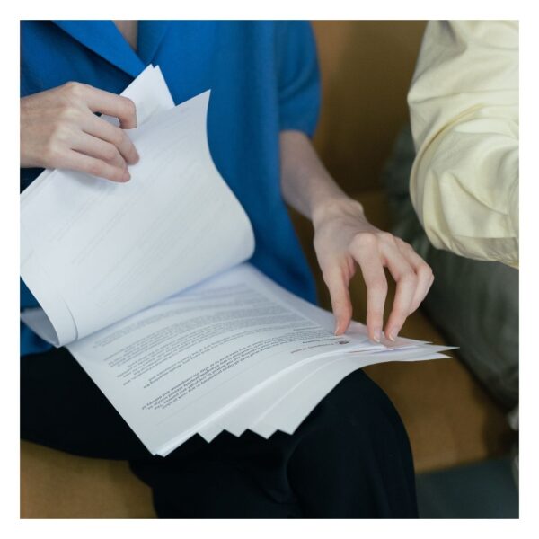 person going through documents