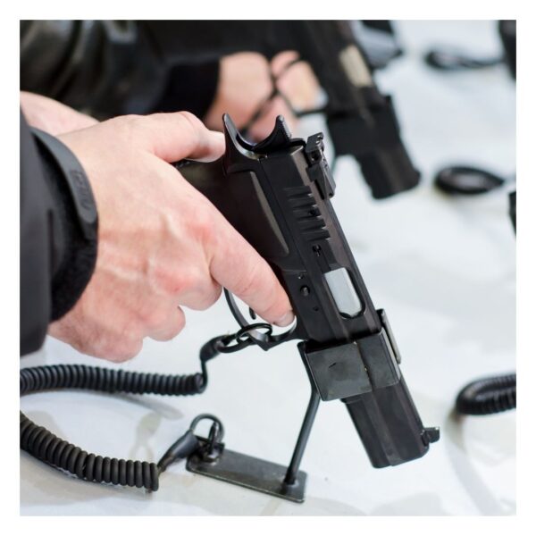 Person holding a gun