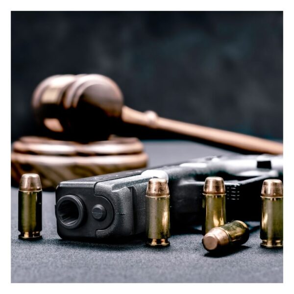 Gun with legal hammer behind it