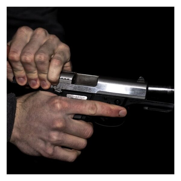 Person loading a gun
